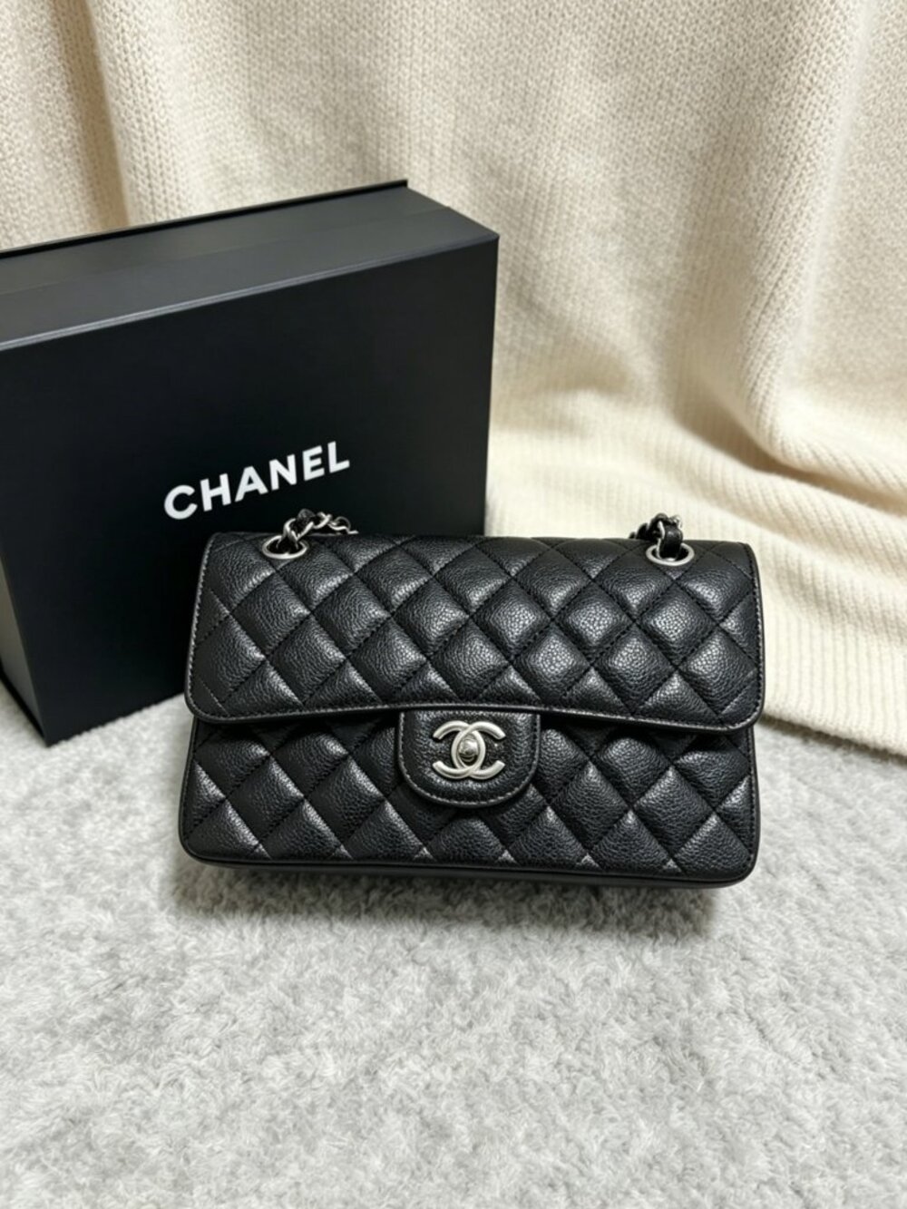 CHANEL Classic Flap Bag in Black Caviar Leather